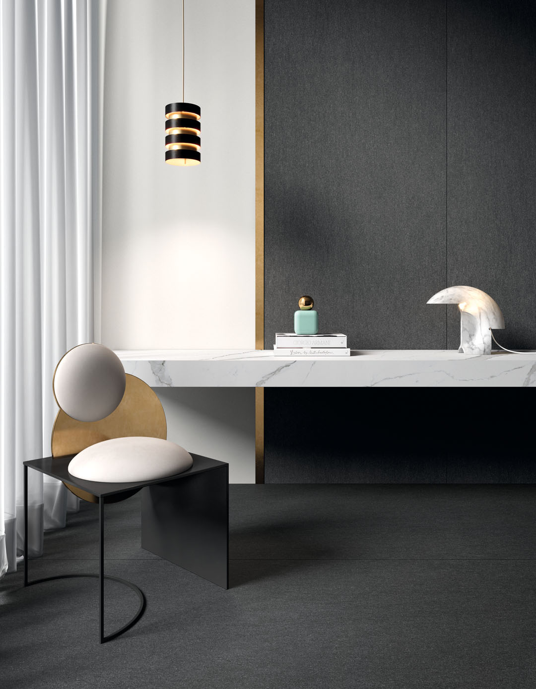Studio con sedia di design e scrivania su misura. Il rivestimento e pavimento sono realizzati con la serie Basalto nel colore Nero